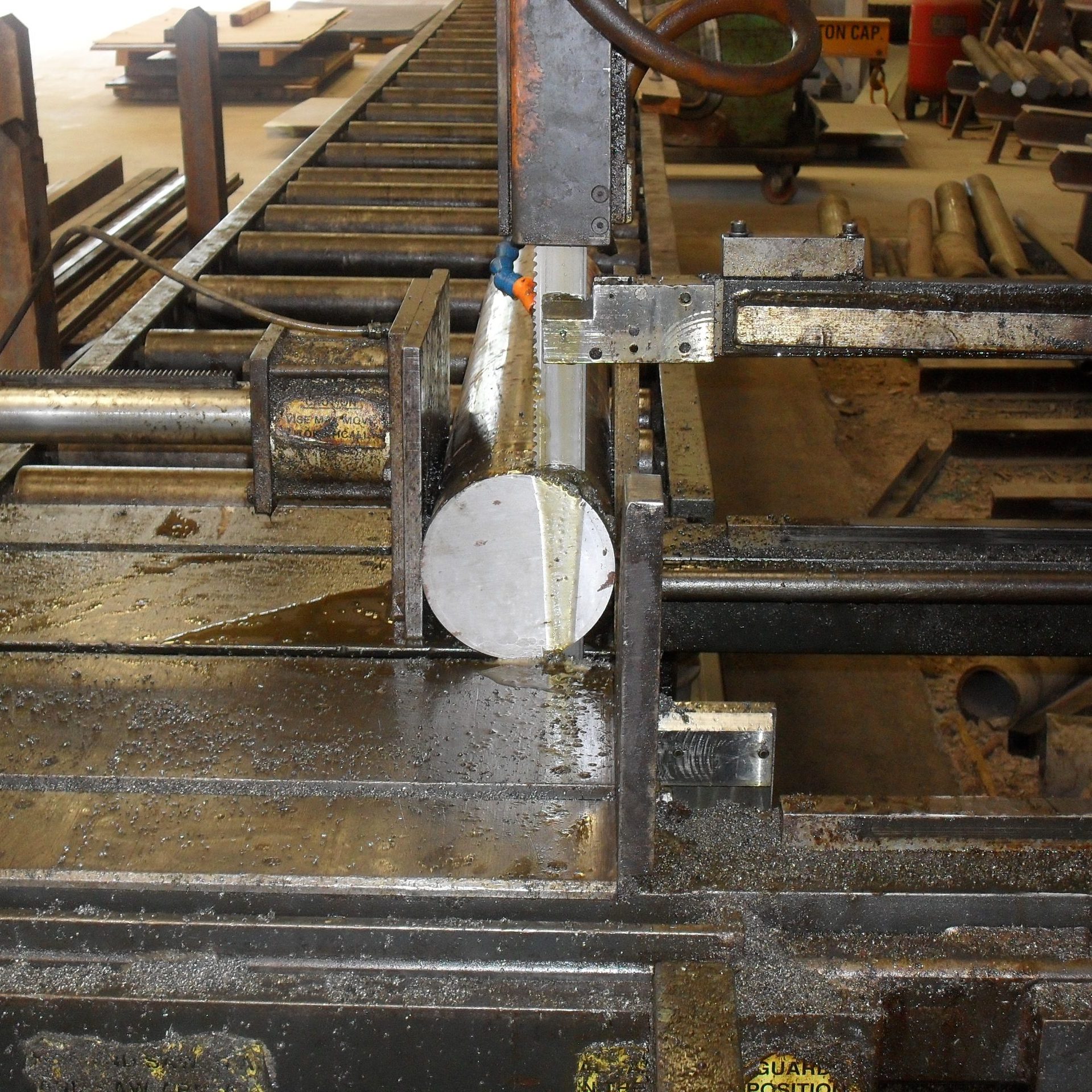 SDC13097 Saw cutting metal services by Tri-State Metals.