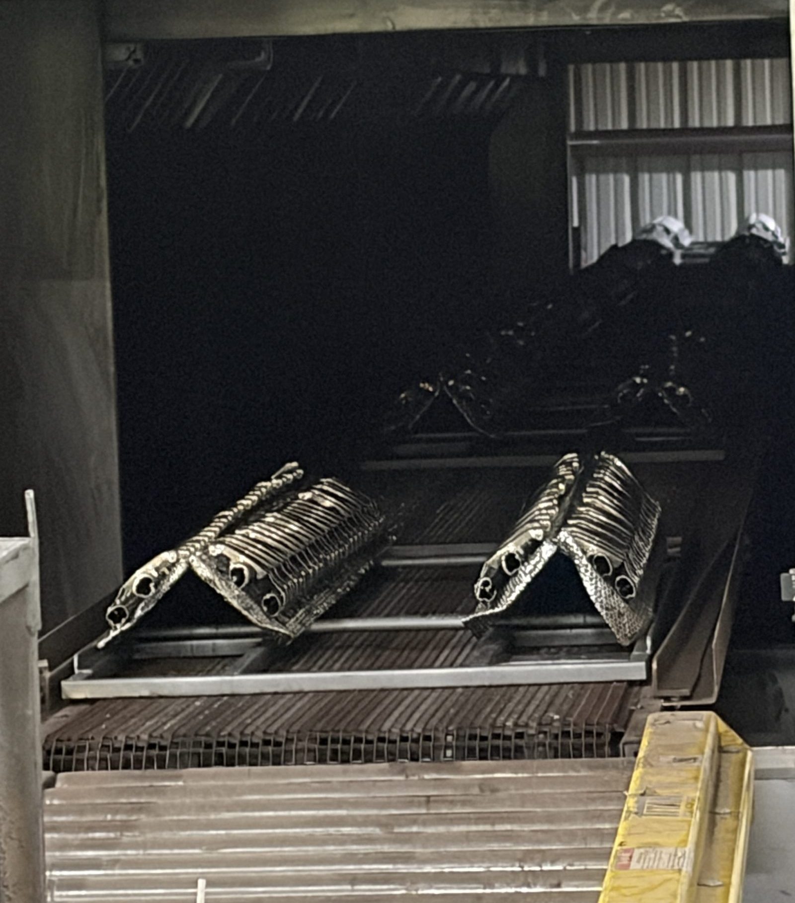 IMG_1792 Chemical wash conveyer with product at Tri-State Metals in Florence, AL.